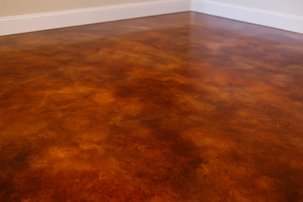 a red epoxy floor from San Antonio Concrete Master in San Antonio, TX - concrete driveway installation